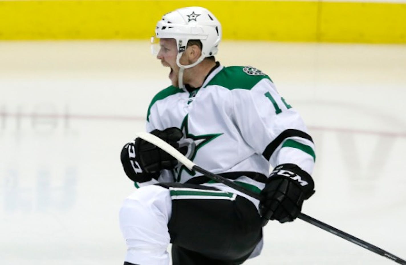 Dallas Stars center Radek Faksa celebrates his goal during the second period of an NHL hockey game against the Arizona Coyotes on Thursday, March 31, 2016, in Dallas.