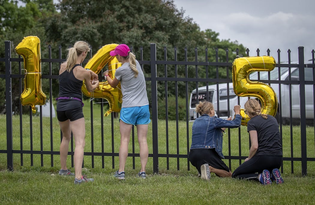 After Gabriele Grunewald's burial, family, friends, and supporters gathered for a song and a one-mile run/jog/walk to honor Gabriele just outside Hillside Cemetery.