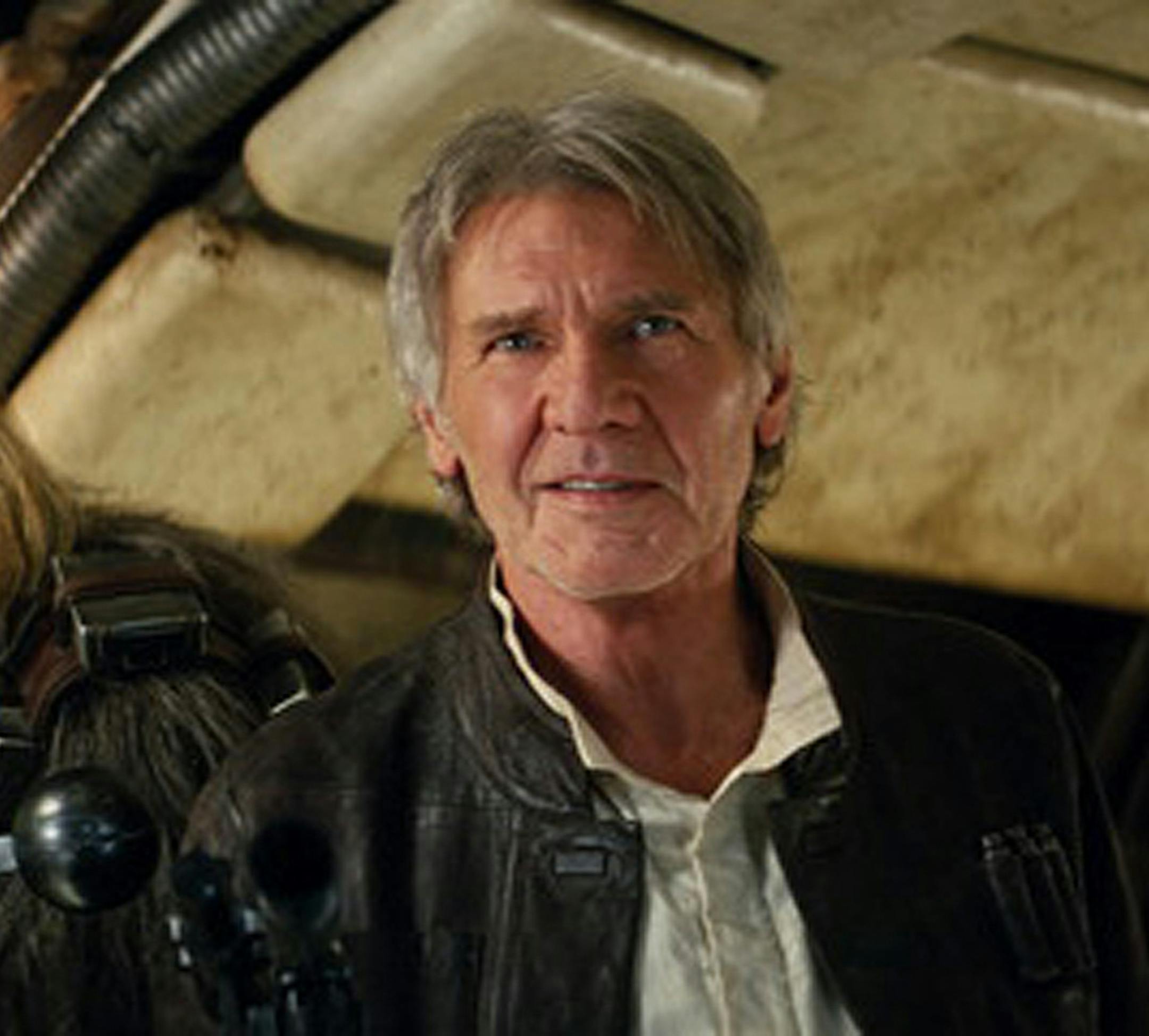 This photo provided by Lucasfilm shows Peter Mayhew as Chewbacca and Harrison Ford as Han Solo in "Star Wars: The Force Awakens," directed by J.J. Abrams. Lawrence Kasdan co-wrote the screenplay with Abrams. The movie opens in U.S. theaters on Friday, Dec. 18, 2015. (Film Frame/Lucasfilm via AP) -