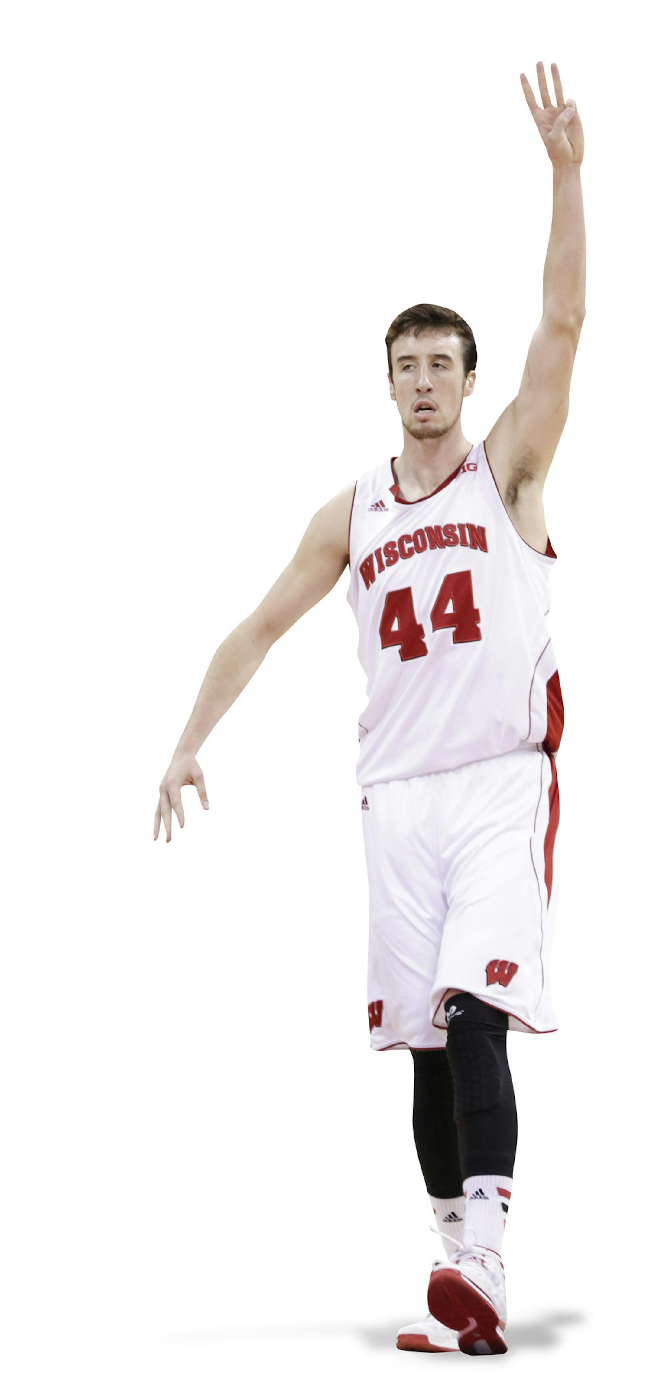 Wisconsin's Frank Kaminsky (44) signals after hitting a 3-point basket against Marquette during the second half of an NCAA college basketball game Saturday, Dec. 7, 2013, in Madison, Wis. Wisconsin won 70-64. (AP Photo/Andy Manis) ORG XMIT: WIAM1