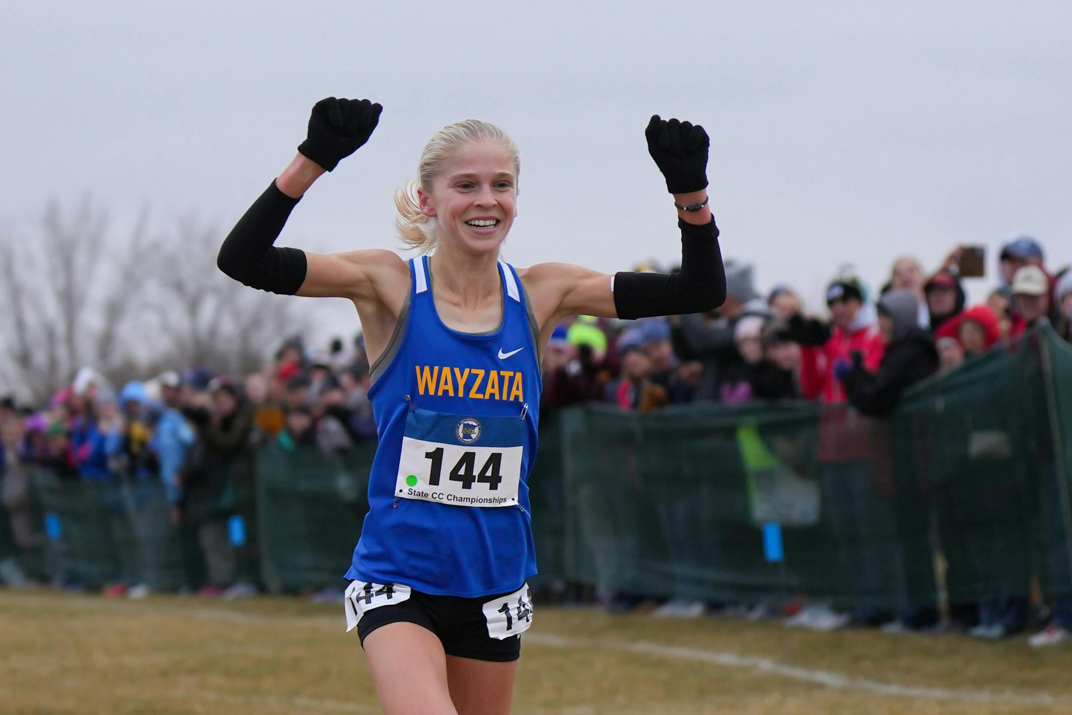Abbey Nechanicky of Wayzata crosses the finish line with a time of 16:47.61 Saturday, Nov. 5, 2022 in Northfield, Minn. Class 3A cross-country state championships. Nechanicky took home the state title, with the Wayzata Trojans winning the girls team title.