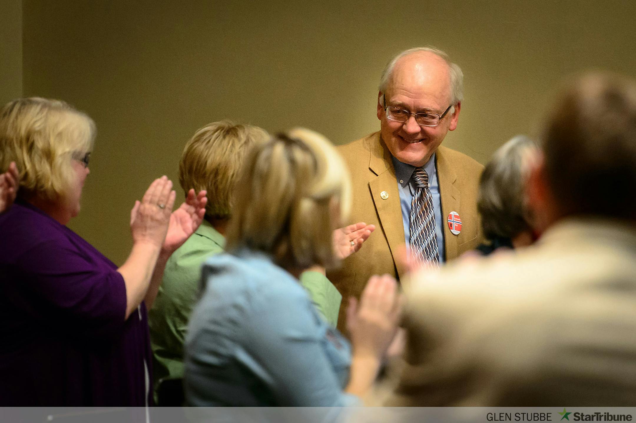 House members gave a standing ovation to retiring Rep. John Benson, DFL-Minnetonka.   ]     Friday, May 16, 2014   GLEN STUBBE * gstubbe@startribune.com