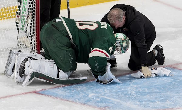 Minnesota Wild goalie Devan Dubnyk was looked at by a trainer in the second period. Dubnyk ended up leaving the game.