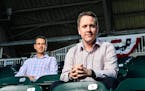 From left, Twins senior vice president and general manager Thad Levine and executive vice president and chief baseball officer Derek Falvey. ] AARON L