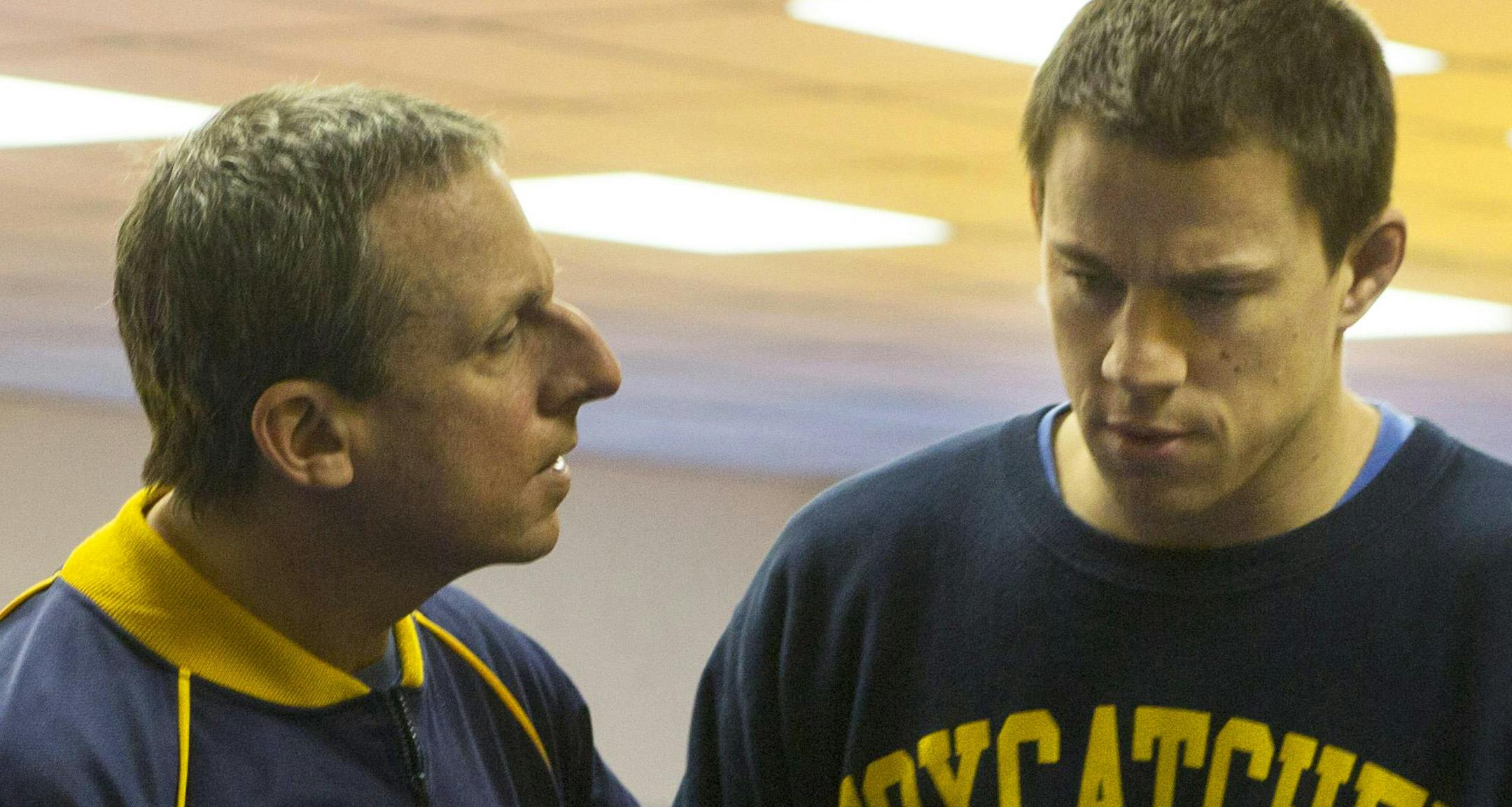 This image released by Sony Pictures Classics shows Steve Carell, left, and Channing Tatum in a scene from "Foxcatcher." The film, based on Olympic wrestler Mark Schultz, will be released on Nov. 14, 2014. (AP Photo/Sony Pictures Classics, Scott Garfield)