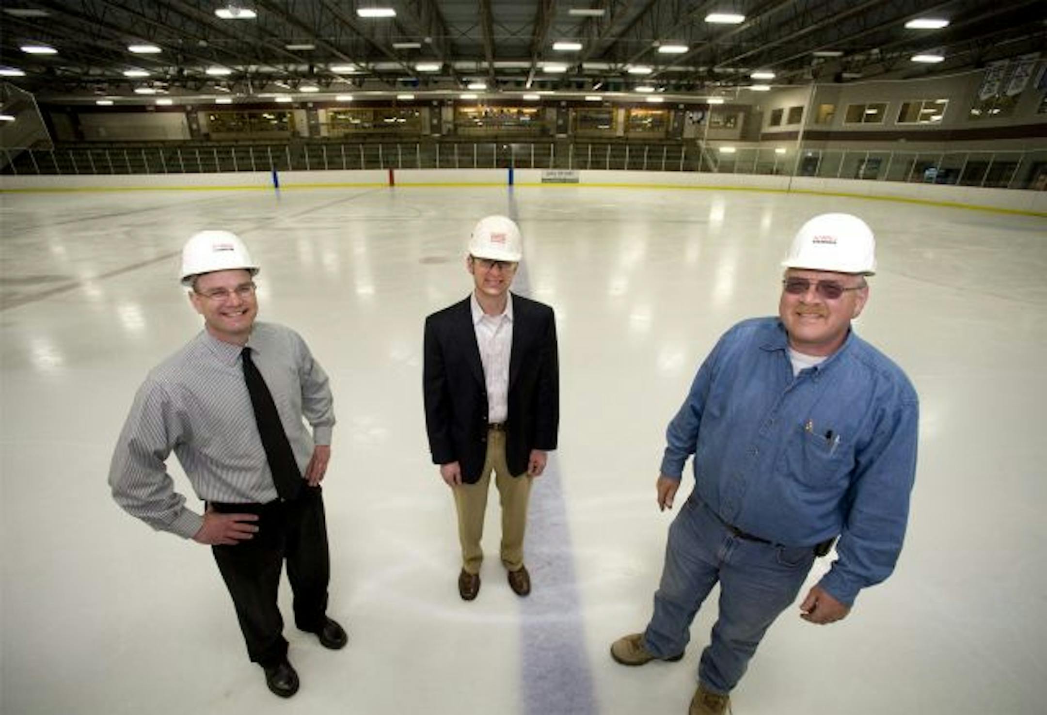 From left, Steve Lutz, design engineer; Harris Cos. CEO Greg Hosch, and job supervisor Dave Dabruzzi are retrofitting the Eagan municipal ice arena with a heating and cooling system that should pay for itself in about eight years through gas and electricity balance.