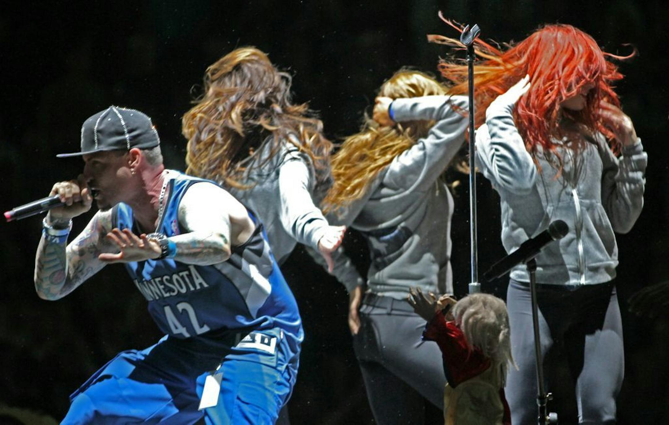 Minnesota Timberwolves vs. Boston Celtics, Target Center, 3/30/12. (left to right) Vanilla Ice performed between half-time.