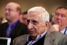 Longtime Minneapolis Star Tribune sports columnist Sid Hartman listened as NFL Commissioner Roger Goodell answered his question during Wednesday's pre
