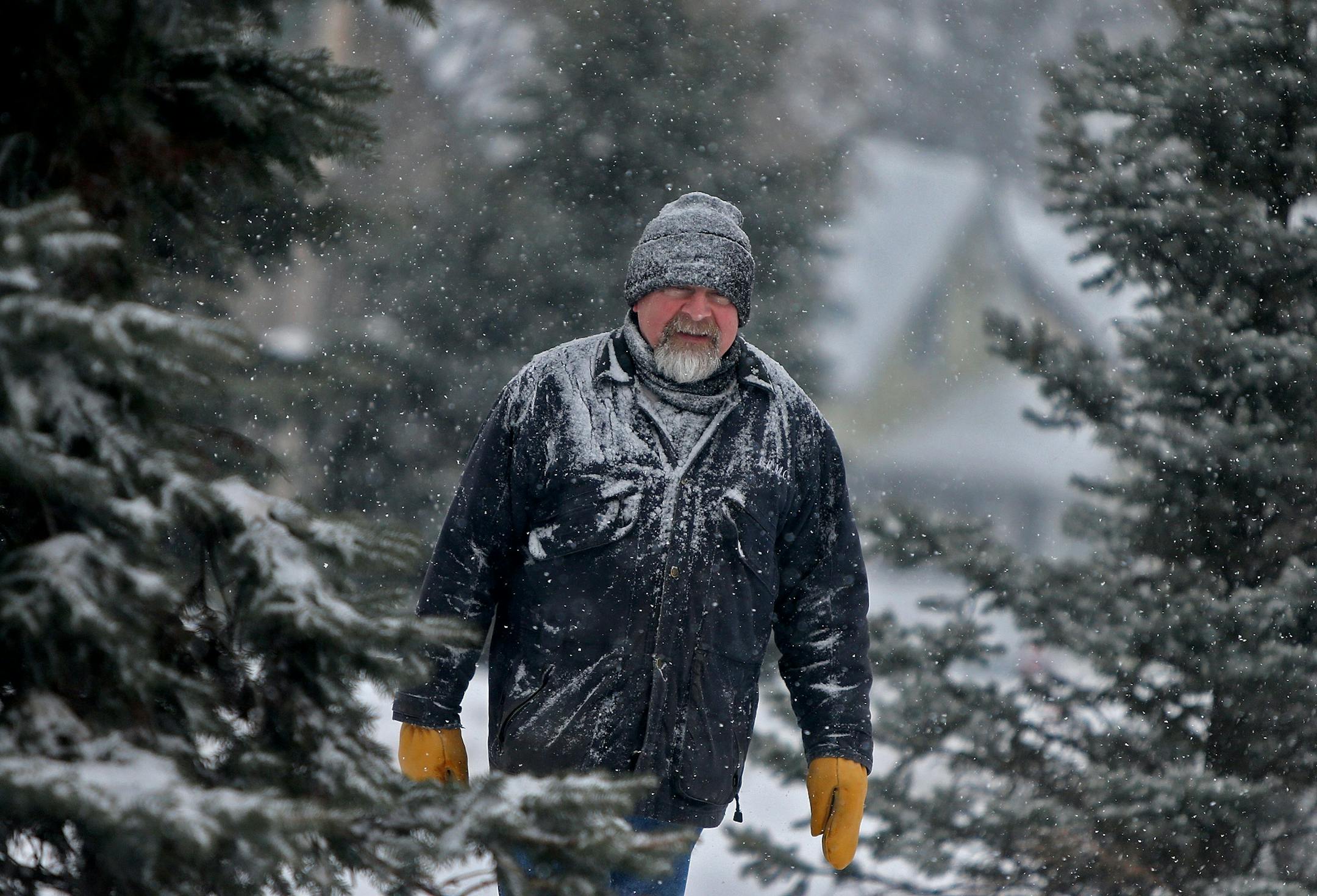 Blake Anderson said he never misses a morning without a 40-minute walk as he made his way down a snowy path Monday, Feb. 17, 2014 in Bayport.