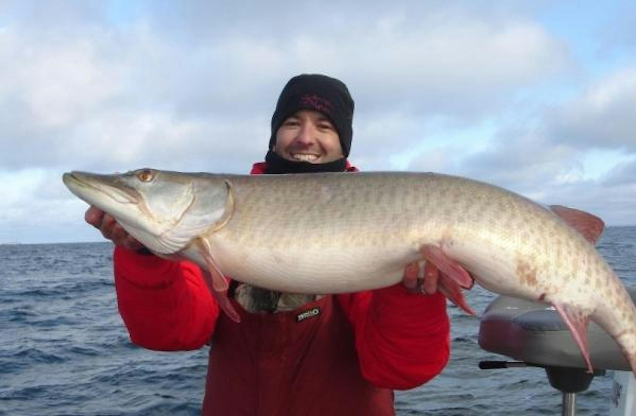 Fall can mean big fish if you are ready during a feeding window. Logan Schweiss holds a heavy fall muskie caught last season with the author, Travis Frank.