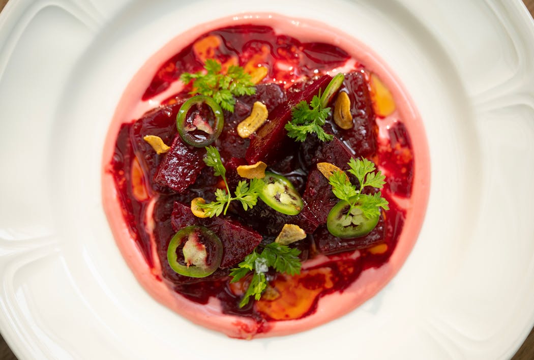 The tuna crudo, with beet vinaigrette, fried garlic, and serranos, is among the most compelling dishes at Blondette.