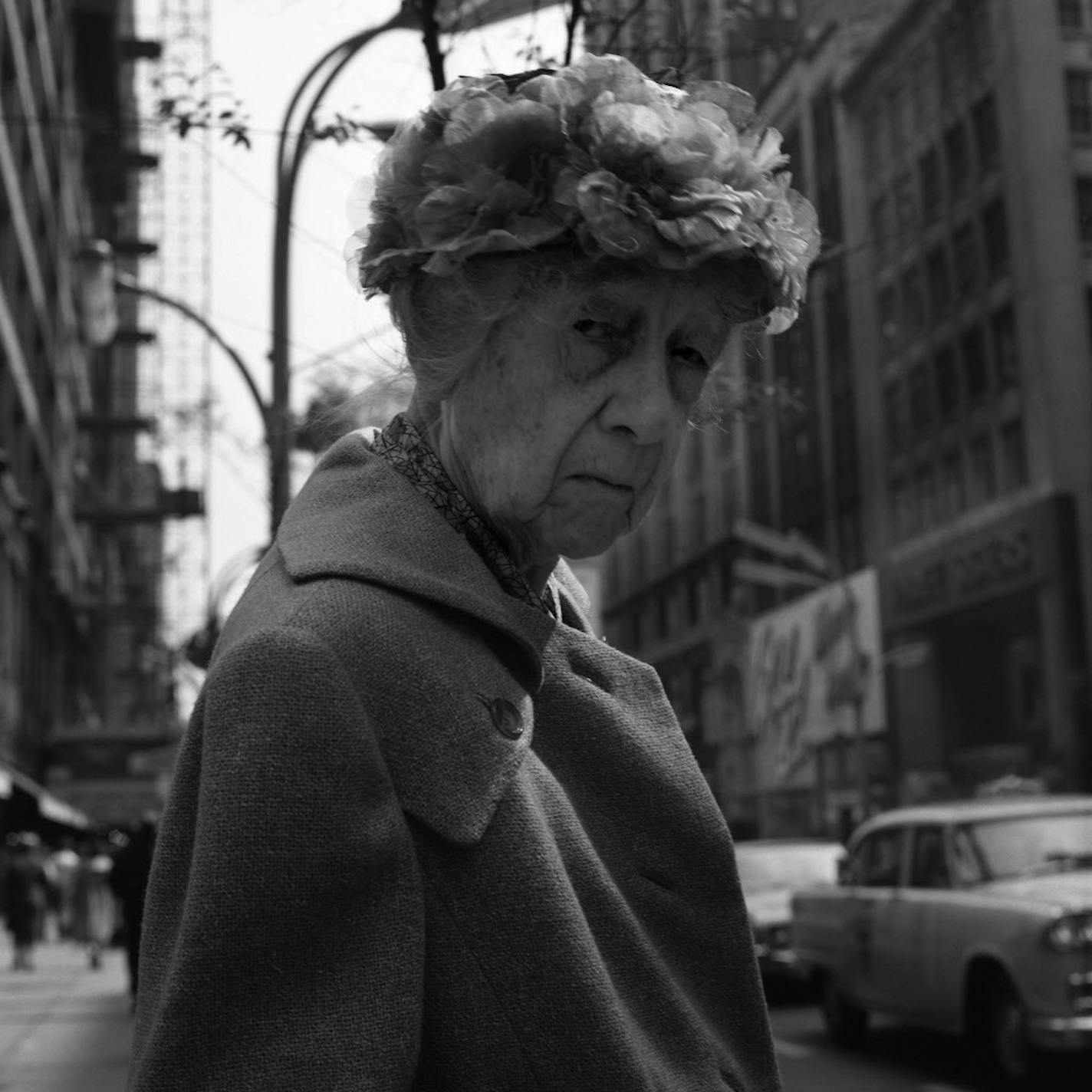 Vivian Maier photo, "Woman with Floral Hat," Chicago, 1961