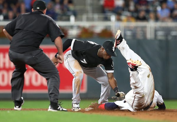 Minnesota Twins shortstop Jorge Polanco (11) stole second base on Chicago White Sox shortstop Tim Anderson (7) in the fifth inning at Target Field Tue