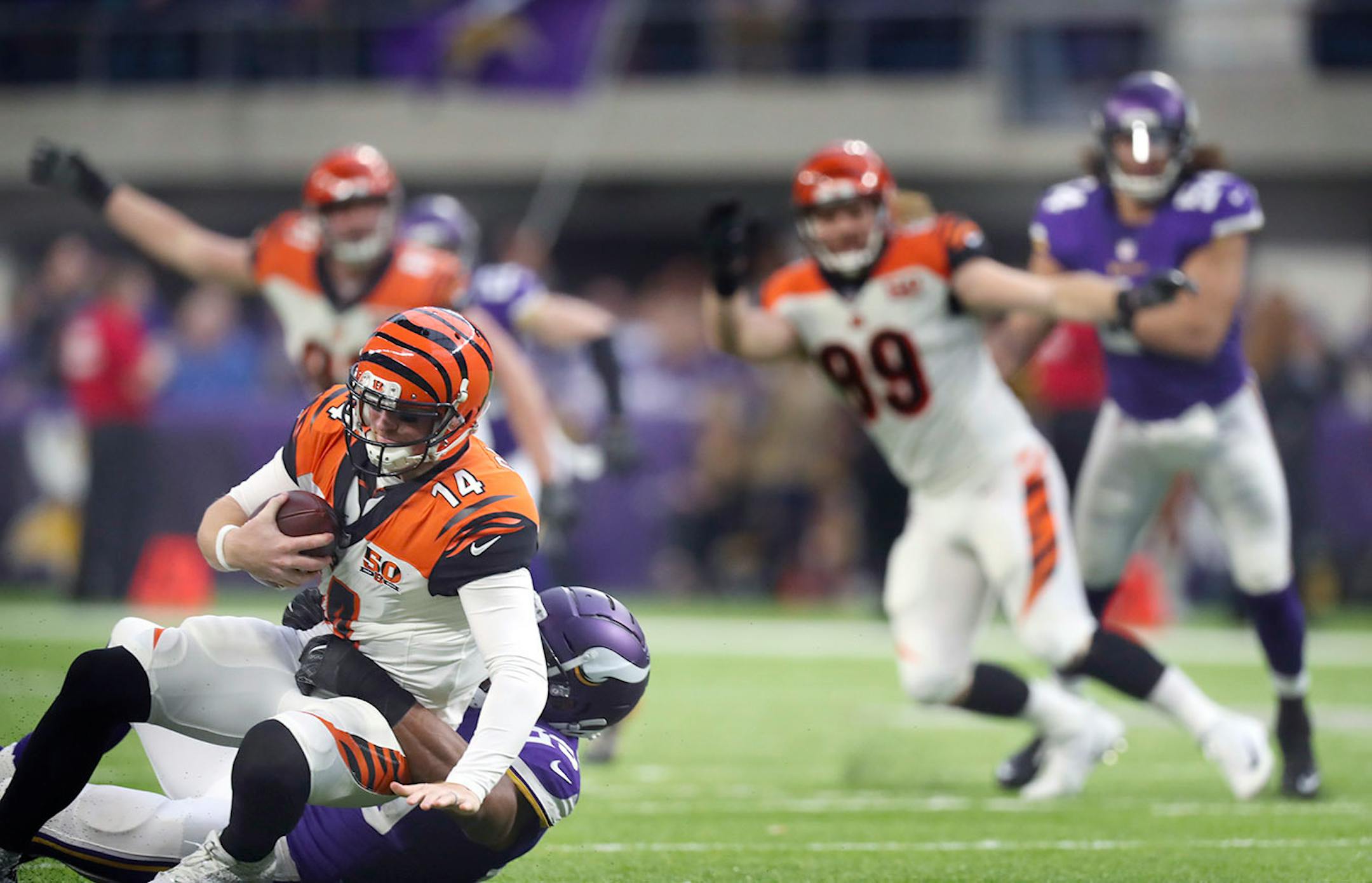 Minnesota Vikings defensive end Danielle Hunter (99) sacked Cincinnati Bengals quarterback Andy Dalton (14) for a nine yard loss in the second quarter.