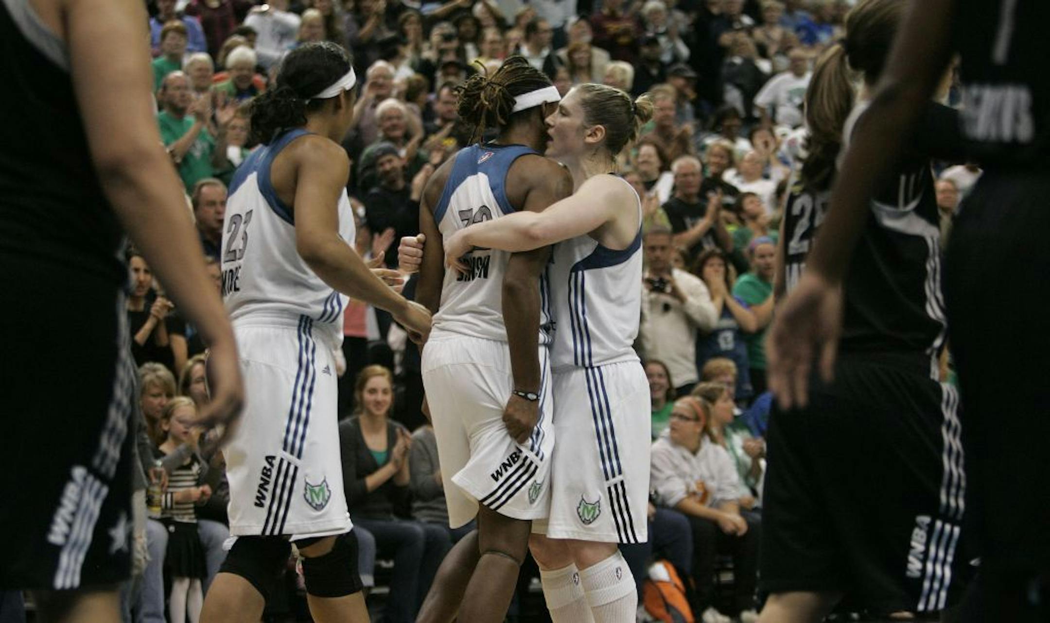 Lynx Lindsay Whalen celebrated with teammate Jessica Adair after getting an offensive rebound near the end of the fourth quarter at the Target Center in Minneapolis Minn., Friday, September 16, 2011. Lynx won 66-65.