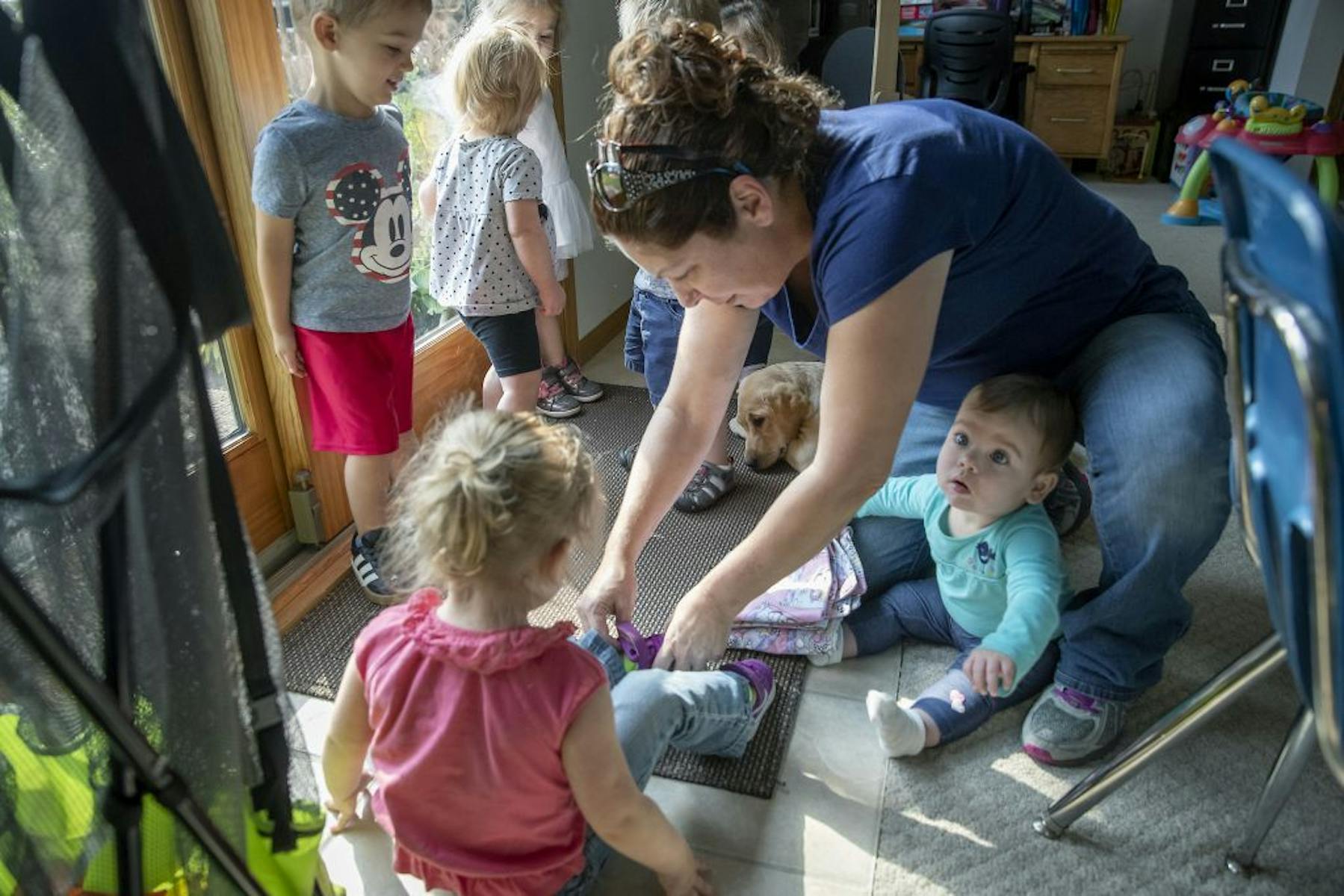 Julie Seydel, who offers child care in her Andover home, said she has discouraged others from doing the same in today’s climate.