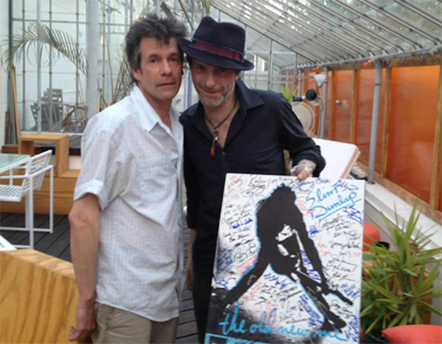 Paul Westerberg and Tommy Stinson recently signed a poster benefiting Slim Dunlap's recovery from last year's stroke. / Photo by PD Larson for "Songs for Slim"