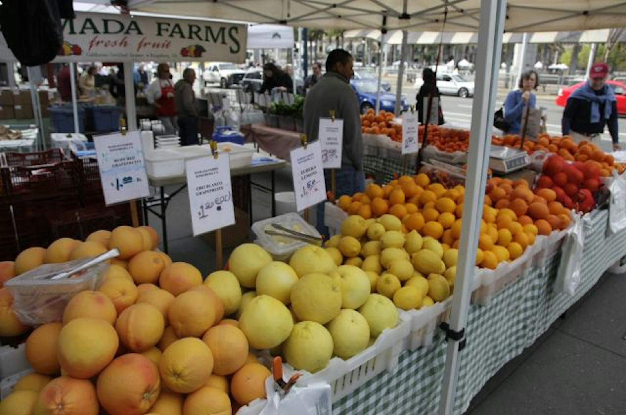 A selection of fruits are shown for sale at the Ferry Building Farmer's Market in San Francisco, Tuesday, March 17, 2009. Wholesale prices edged up a tiny 0.1 percent in February as a big decline in food prices offset a second monthly increase in energy costs, the Labor Department reported Tuesday. Food costs fell for a third straight month, dropping 1.6 percent in February, the biggest one-month decline in three years.