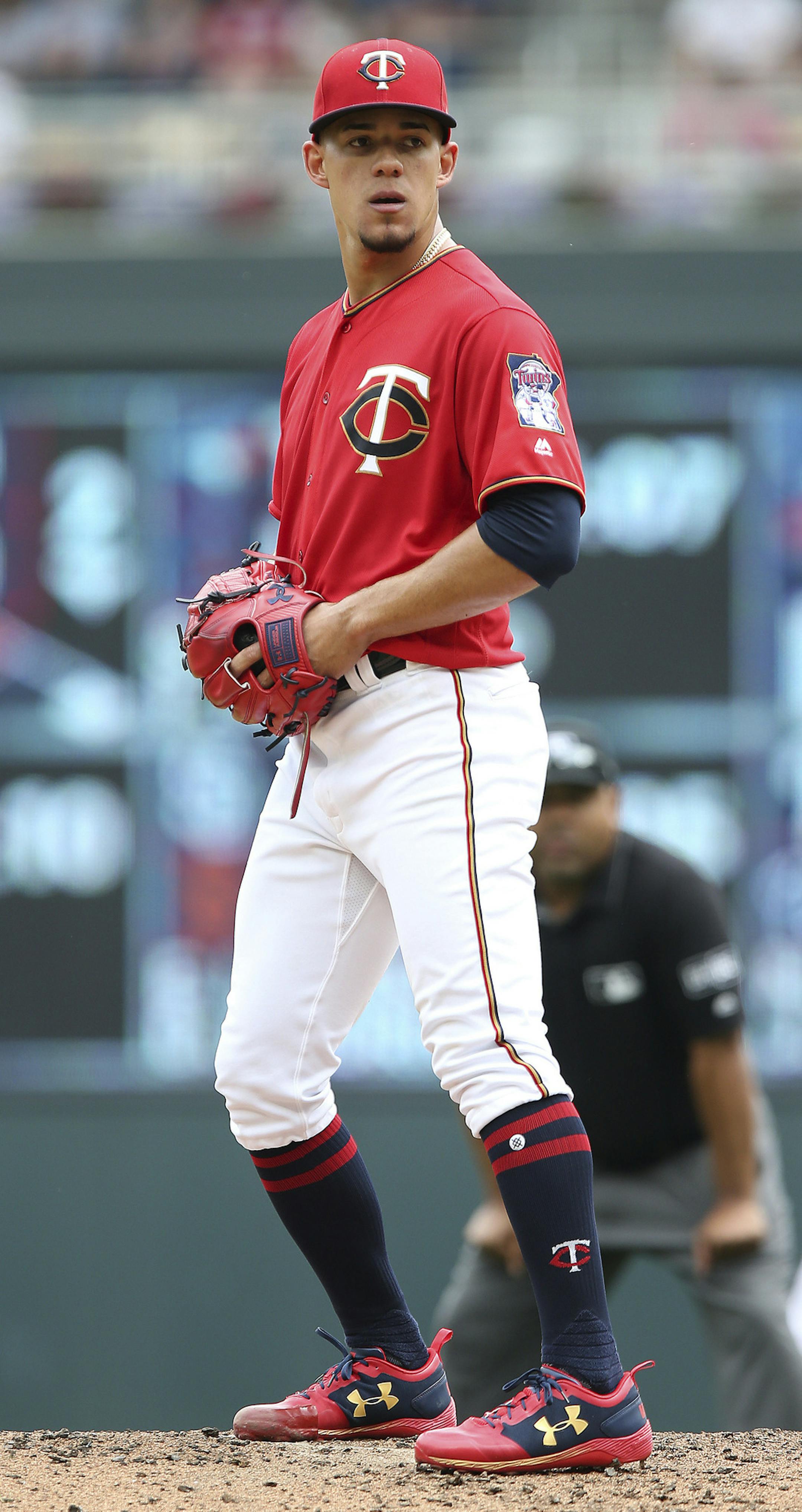 Minnesota Twins pitcher Jose Berrios stands on the mound in the second inning of a baseball game against the Texas Rangers, Sunday, June 24, 2018, in Minneapolis. (AP Photo/Stacy Bengs)
