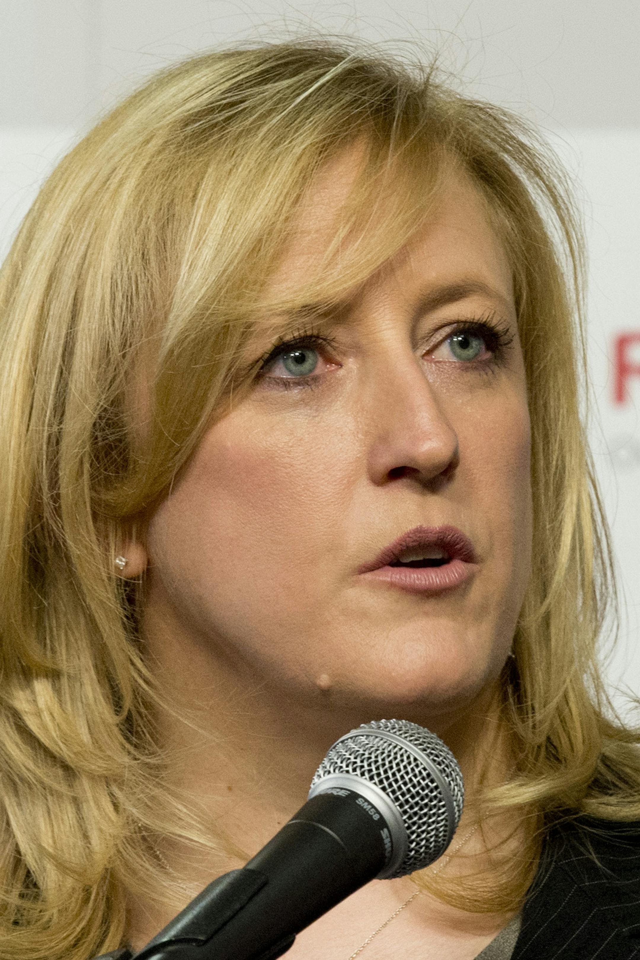 Transport Minister Lisa Raitt announces new railway safety measures during a news conference on Wednesday, April 23, 2014 in Ottawa, Ontario. Raitt announced that the DOT-111 tankers, which are used to carry crude oil and ethanol and are prone to rupture, must be retired or retrofitted within three years. (AP Photo/The Canadian Press, Adrian Wyld)
