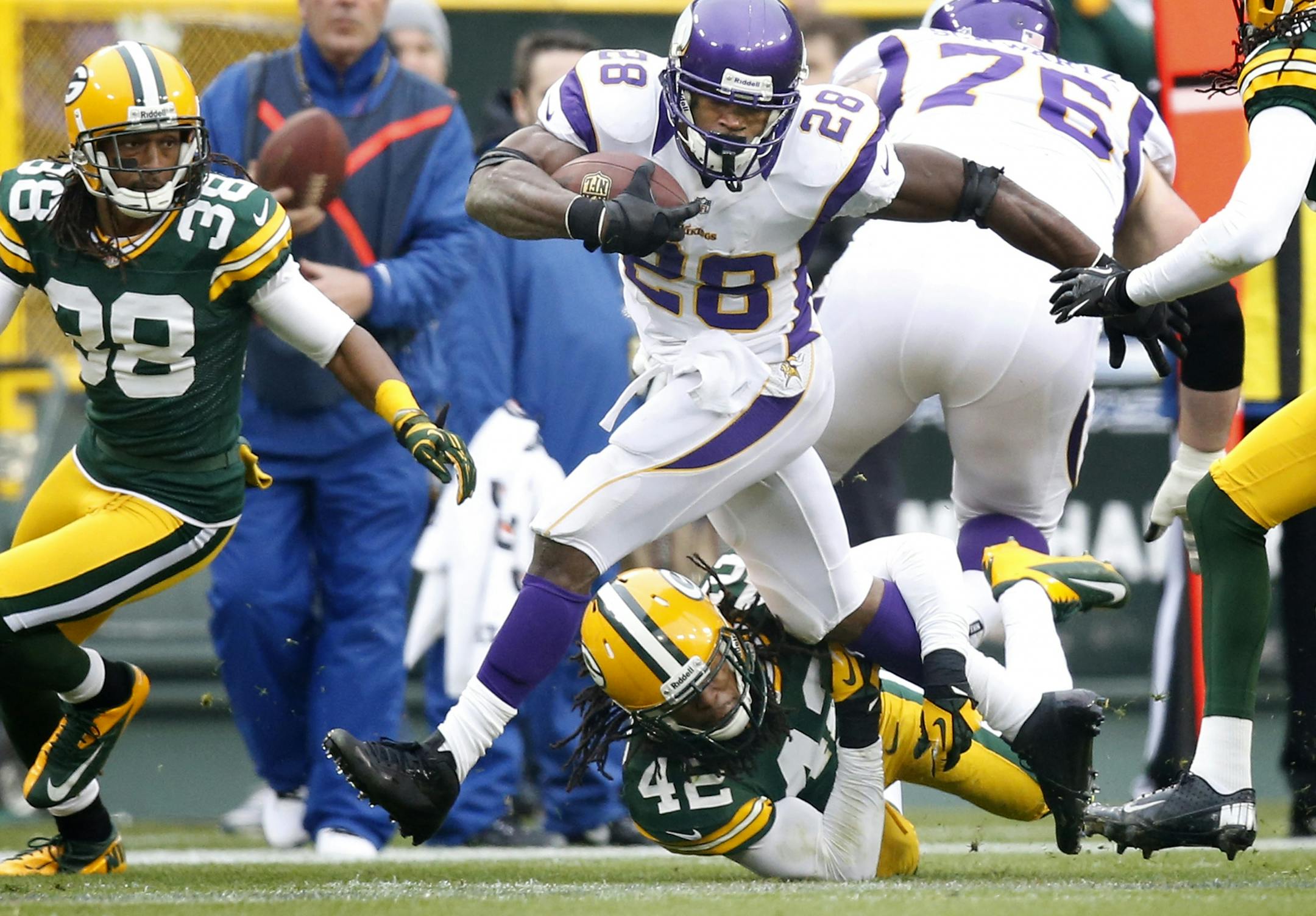 Vikings running back Adrian Peterson broke away for an 82-yard touchdown run against the Packers in the second quarter.