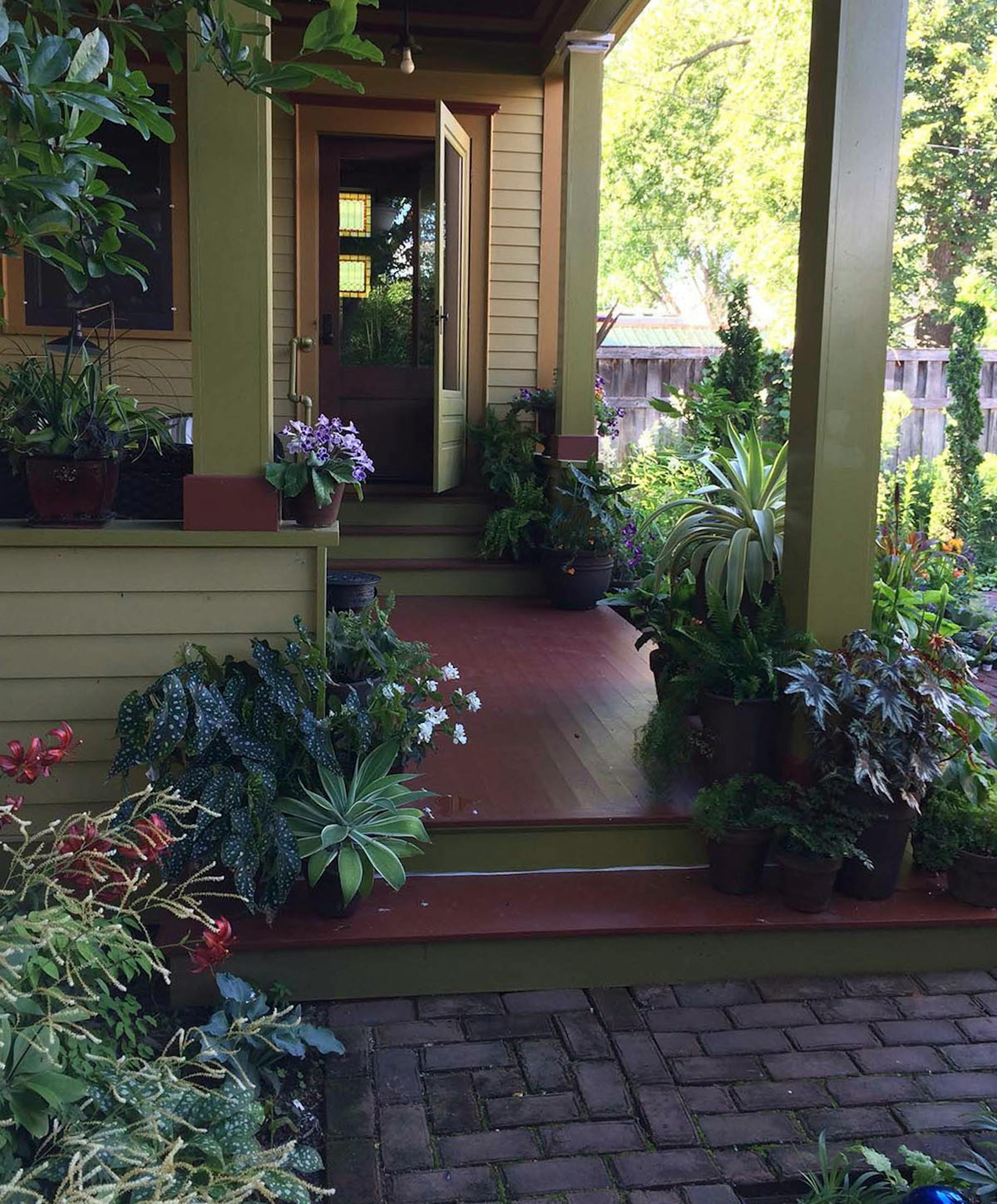 Container plantings line the path to Fitzgerald's door.