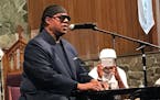 Musician Stevie Wonder joined a peace conference in Minneapolis and Saturday and urged those there to join the effort.