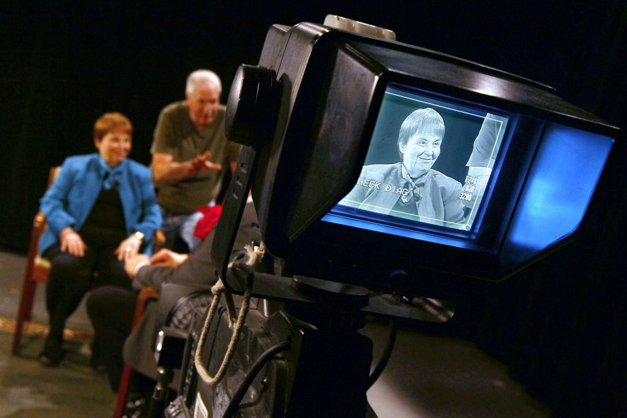 A camera is trained on Judy Corrao as she and the crew prepare to film The Judy Corrao Show at The Minneapolis Television Network in Minneapolis December 12, 2012.