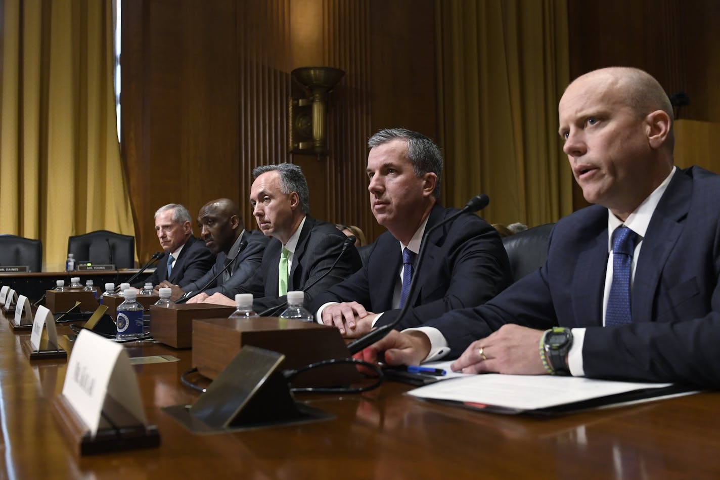 Prime Therapeutics Senior Vice President, General Counsel, and Interim President and Chief Executive Officer Mike Kolar, right, testifies before the Senate Finance Committee in Washington Tuesday, April 9, 2019, during a hearing to explore the high cost of prescription drugs. Also at the table, from left, Cigna Corporation Executive Vice President and Chief Clinical Officer Steve Miller, CVS Caremark President and CVS Health Executive Vice President Derica Rice, Humana Healthcare Services Segmen