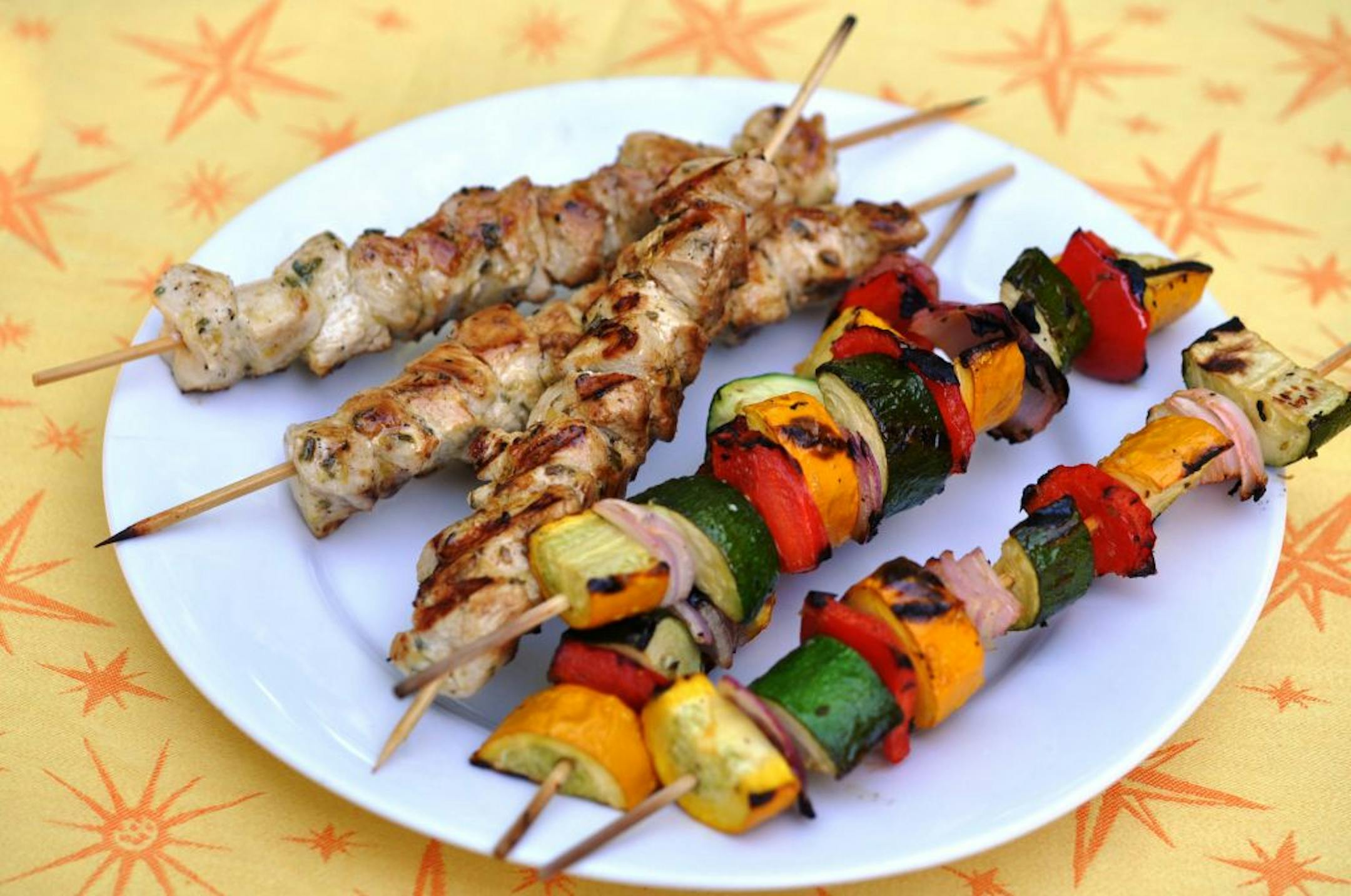 For a complete meal on a stick, chicken and vegetable skewers as a main course, and fruit kebabs with yogurt dipping sauce for dessert.