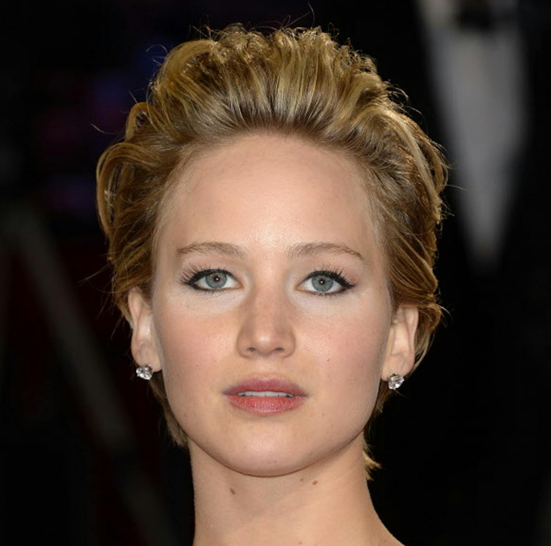 FILE - In this Sunday, March 2, 2014, file photo, Jennifer Lawrence arrives at the Oscars at the Dolby Theatre in Los Angeles. A publicist for Lawrence says the actress has contacted authorities after nude photos of her were apparently stolen and posted online. Intimate images of the Oscar-winning actress began appearing online on Sunday, Aug. 31, 2014, and nude images purported to be of other female celebrities were also being circulated online. The source of the leak was not immediately known.