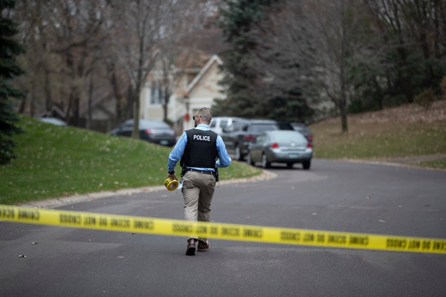 Police at the scene of a shooting Monday, Nov. 4, 2019, in the 7400 block of Hidden Valley Court South in Cottage Grove.