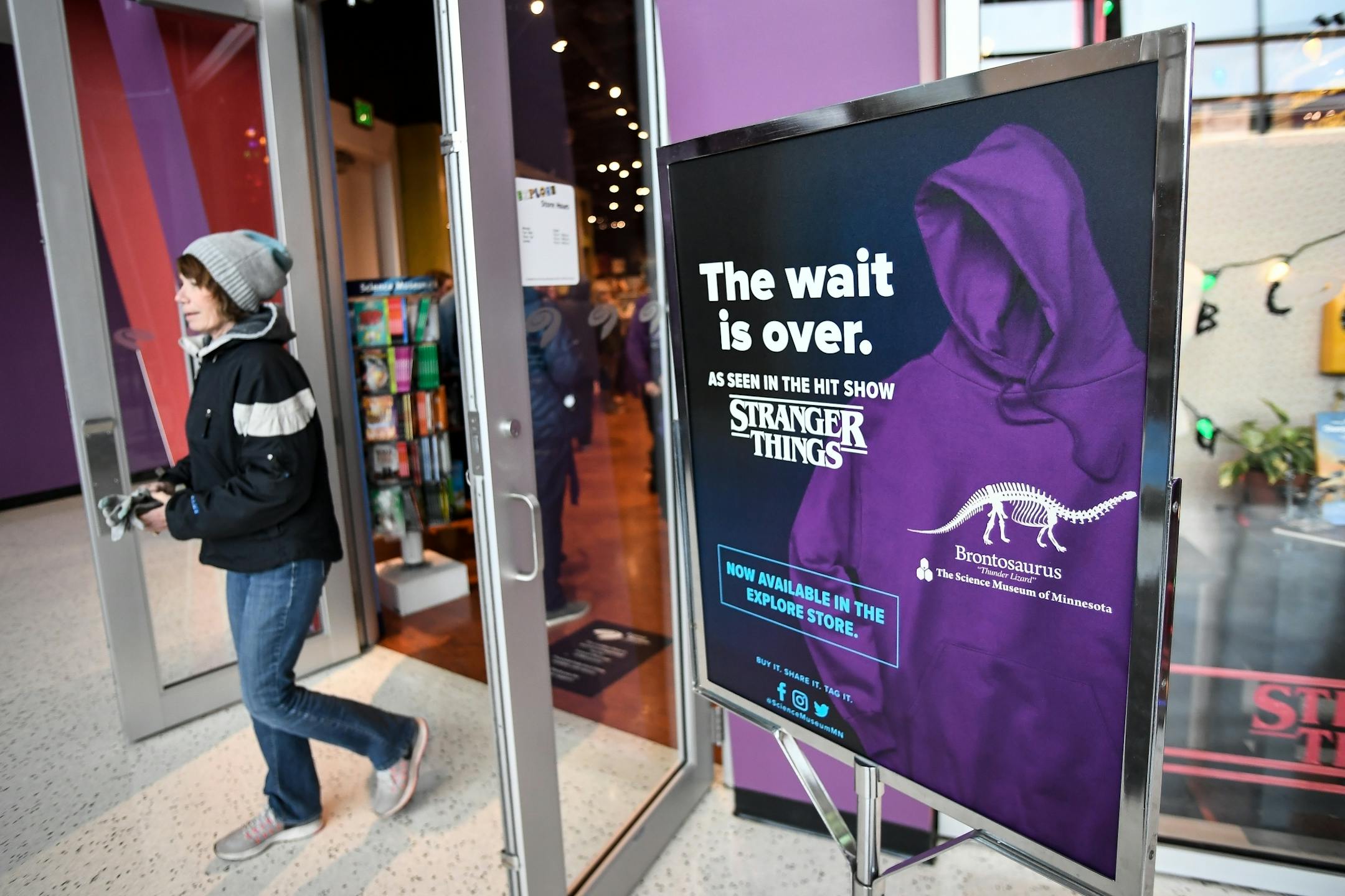 The Science Museum of Minnesota promoted their brontosaurus apparel made popular by Stranger Things outside the gift shop Tuesday morning.
