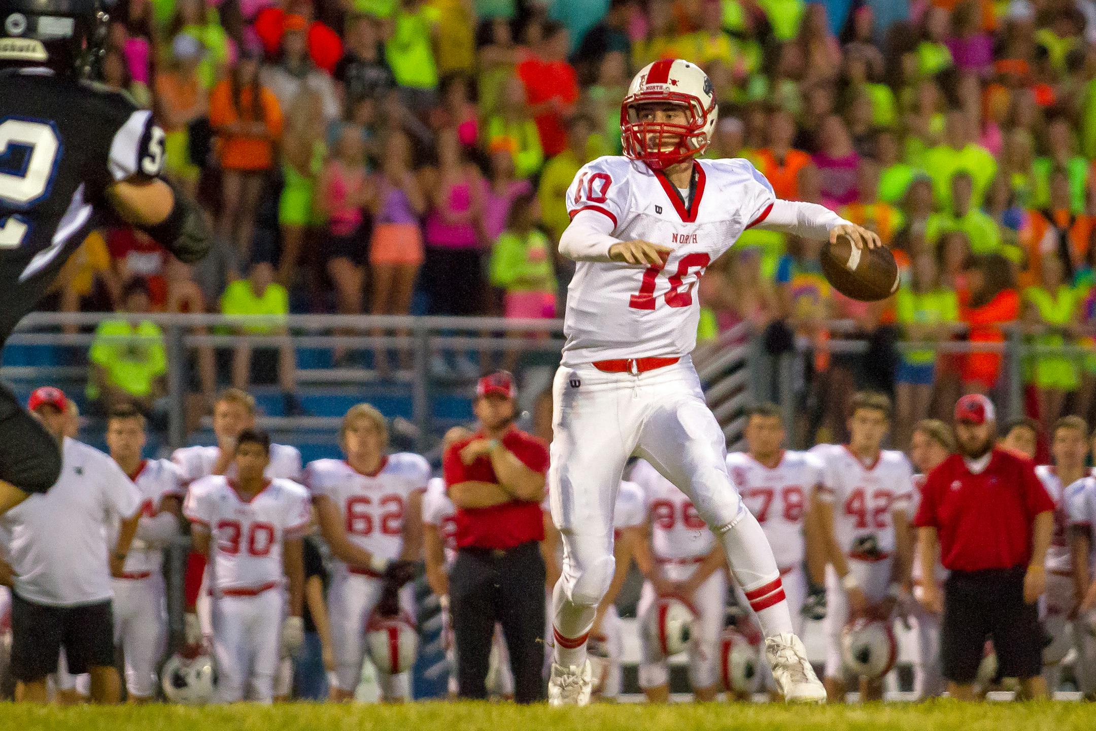 Lakeville North quarterback Drew Stewart (10) vs. Eastview. Photo by Mark Hvidsten