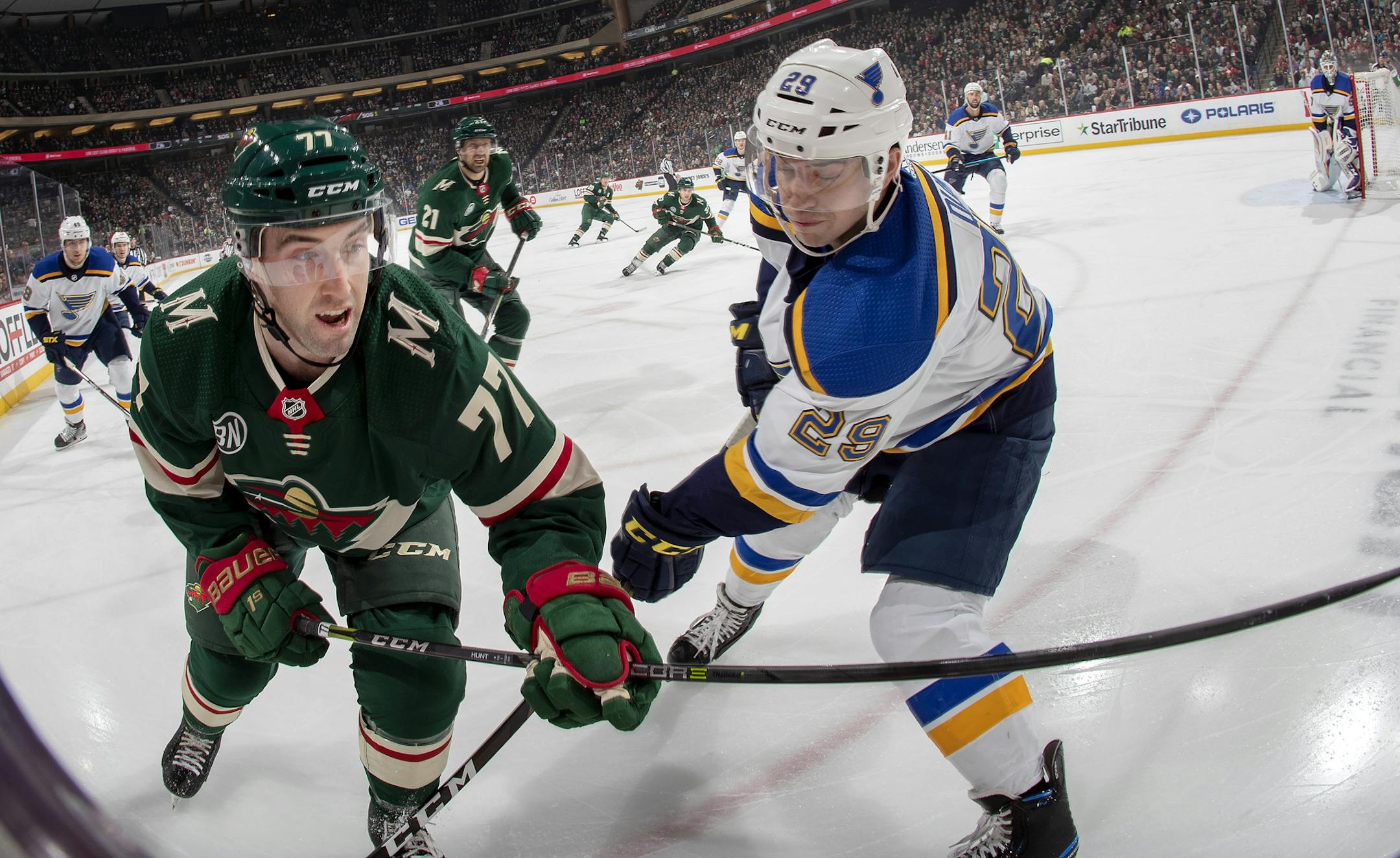 Brad Hunt (77) and Vince Dunn (29) fought for the puck in the first period. ] CARLOS GONZALEZ • cgonzalez@startribune.com – St. Paul, MN – February 17, 2019, Xcel Energy Center, NHL, Hockey, Minnesota Wild vs. St. Louis Blues