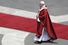 Pope Francis walks after celebrating a Pentecost Mass in St. Peter's Square, at the Vatican, Sunday, June 9, 2019. The Pentecost Mass is celebrated on