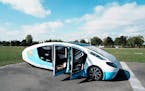 The solar-powered vehicle is on display on a closed road, in Guyancourt, south of Paris, Friday Sept. 24, 2021. A group of Dutch students has reimagin