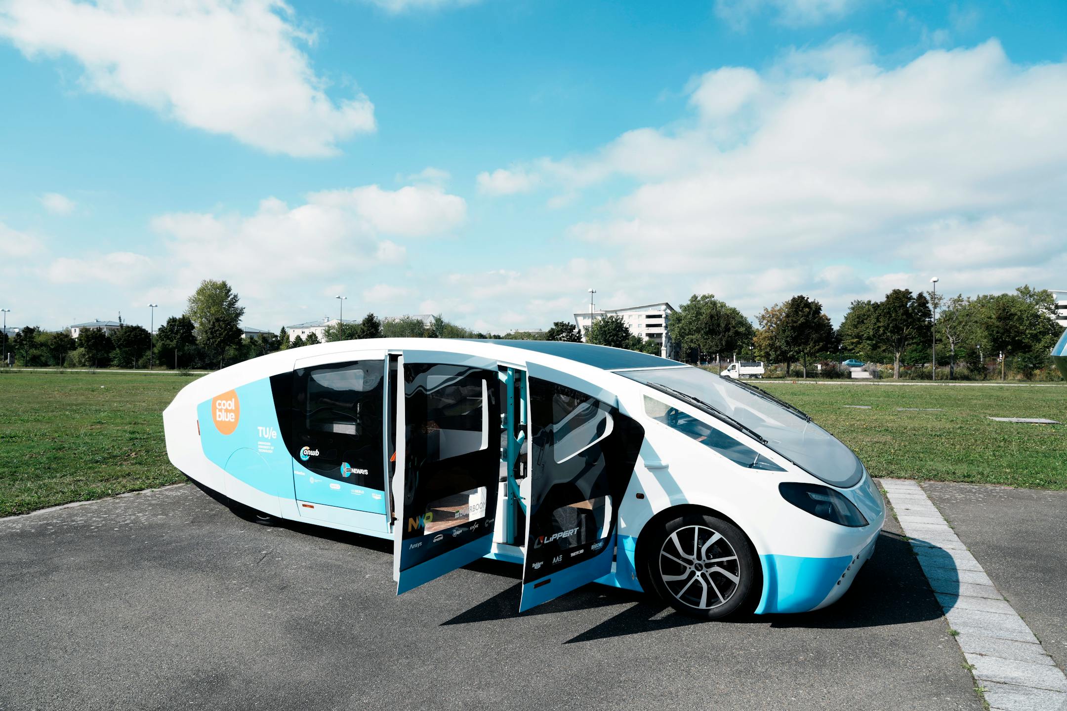 The solar-powered vehicle is on display on a closed road, in Guyancourt, south of Paris, Friday Sept. 24, 2021. A group of Dutch students has reimagined van life and is hitting the road to Portugal. Just don't call their groundbreaking new solar-powered vehicle a campervan. ()
