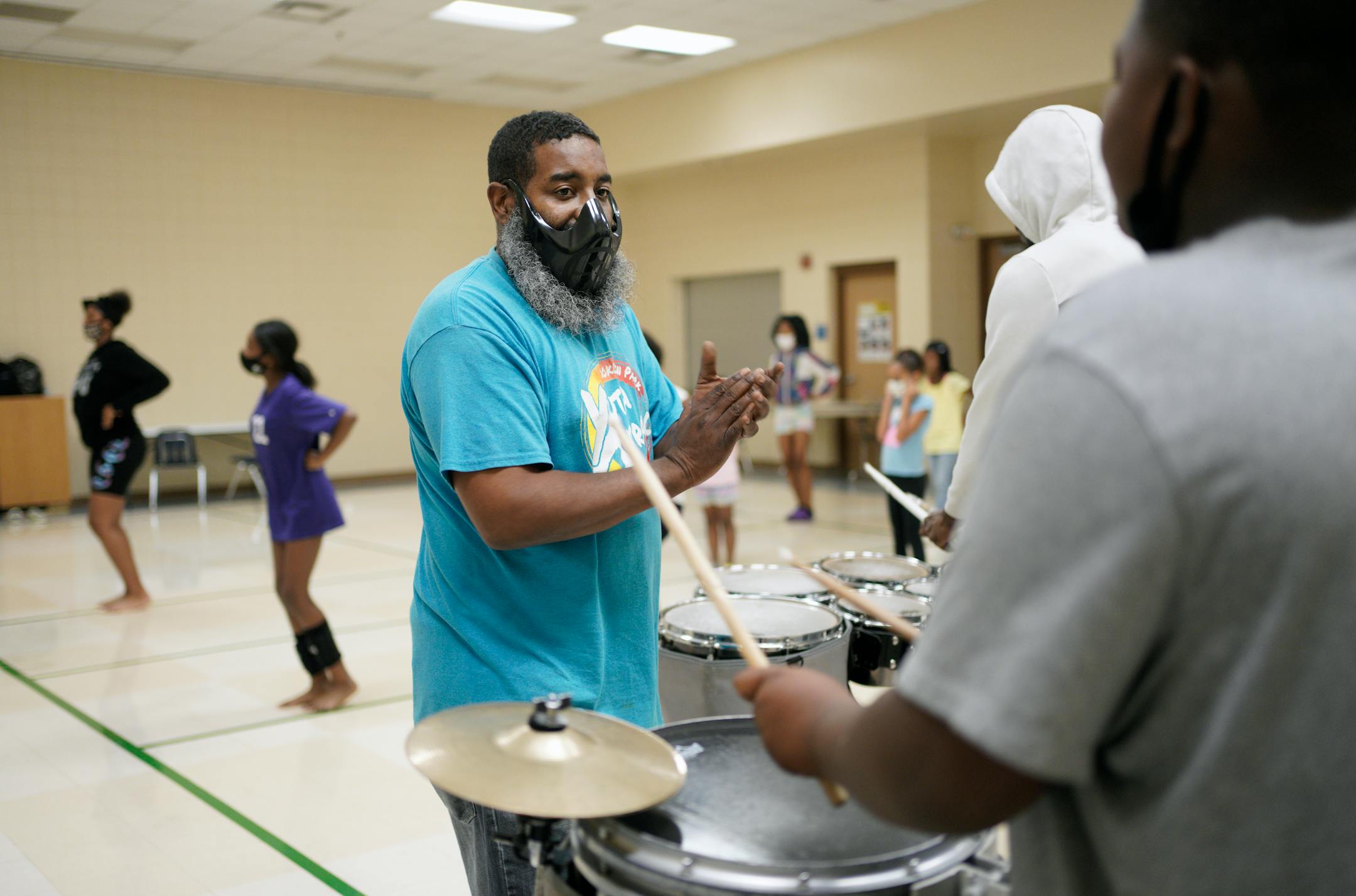 Byron Hawkins directs the TKO Drumline &amp; Knockout Dance Team which teaches drumming rudiments and techniques to ages 8-18, while building community.