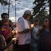 At right, Valerie Castile, the mother of Philando Castile, spoke during a candlelight vigil Thursday held in Falcon Heights where Philando was shot on