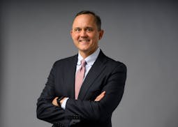 David Royal, Chief Investment Officer and Chief Financial Officer with Thrivent Financial, stands for a portrait Monday, Dec. 11, 2023 at the Star Tri