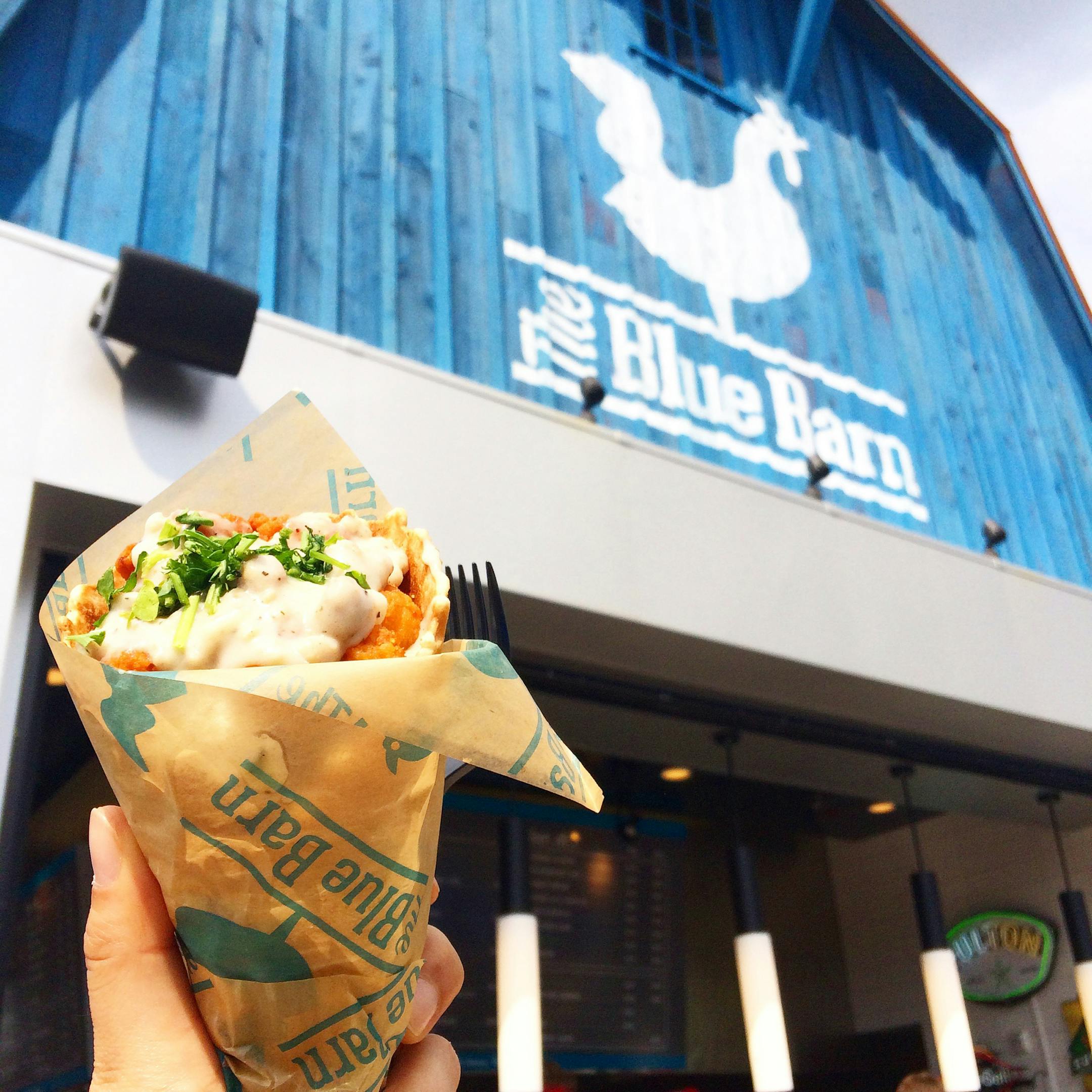 Photo by Linda Gunawan (@lindagunawan). Gunawan writes " I am from Indonesia, and I am currently an international student in Minnesota. I have been in Minnesota for about 10 months, so it is my first time going to the Minnesota State Fair. I had a very good time there, trying a lot of delicious food and seeing interesting exhibitions. The first food that I tried when I was there last Friday was Chicken in a Waffle from the Blue Barn. I took a picture of it with the Blue Barn as the background."