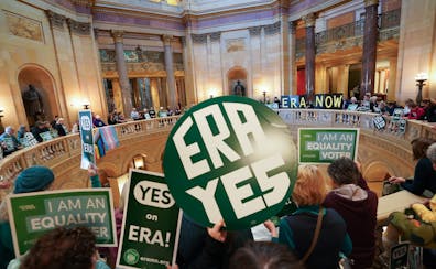 Advocates for an equal rights amendment rally in the Capitol rotunda on the first day of the 2024 legislative session.