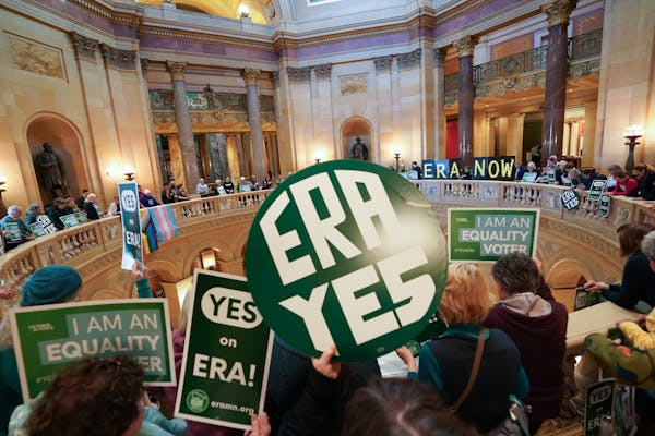 Advocates for an equal rights amendment rally in the Capitol rotunda on the first day of the 2024 legislative session.
