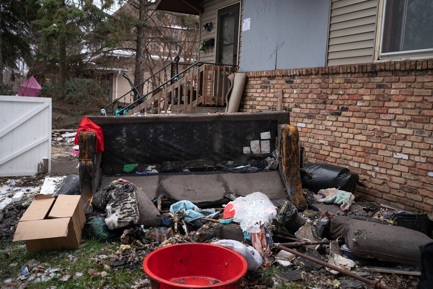 The scene of a house fire in the 1200 block of Arkwright Wednesday ,3, 2024 in, St. Paul, Minn. Sellers told reporters that she witness as St. Paul firefighters pull young kids from the home.] JERRY HOLT • jerry.holt@startribune.com