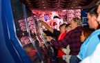 People place bets during the Super Bowl at a casino in Reno on Feb. 11.