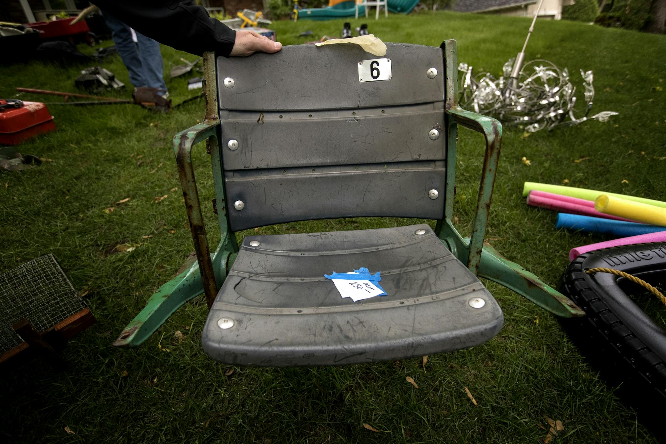 A seat from the former Metropolitan Stadium at the Bud Grant annual garage sale.