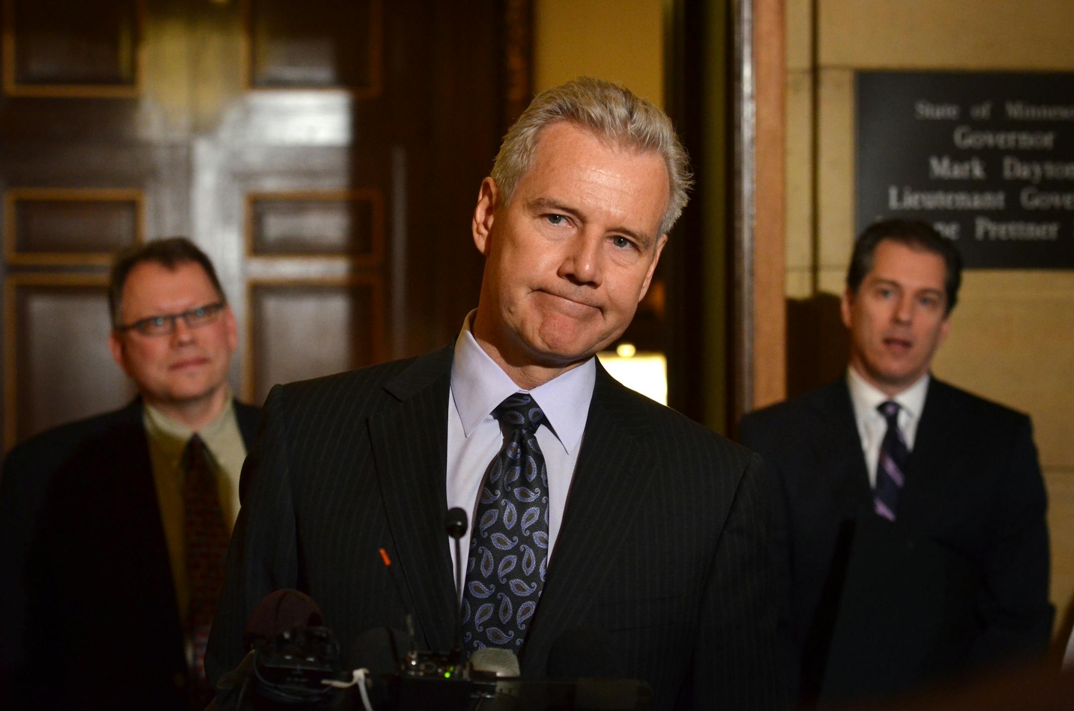 Bob Lux, co owner of Alatus LLC spoke to reporters after meeting with Governor Mark Dayton Wednesday, October 19, 2011. On the left is attorney Scott Benson, on the right the other co owner Phillip Jaffe. The represent Block E.