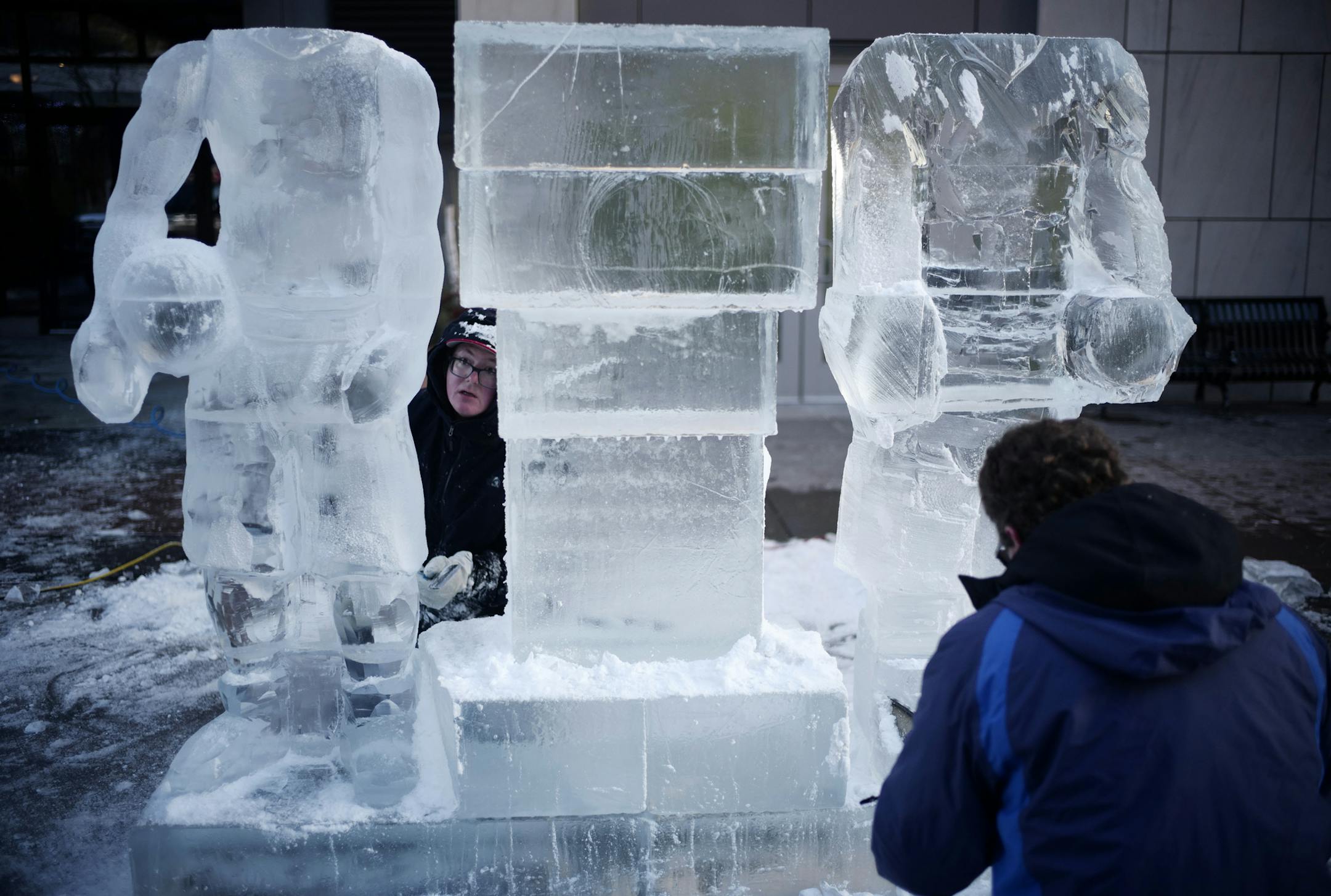 A statue of Jimmy Butler comes to life under the watchful eye of sculptor Sean Leahy who has been carving ice sculptures for 12 years, left, and Jeff Addison, right who is working on Wiggins.]The Timberwolves are carving life-size ice sculptures of Jimmy Butler, Karl-Anthony Towns and Andrew Wiggins. Starts at 10 a.m. today and runs through the afternoon. Mayo Clinic Square, 1st Avenue side, in front of Starbucks patio. Richard Tsong-Taatariiïrtsong-taatarii@startribune.com