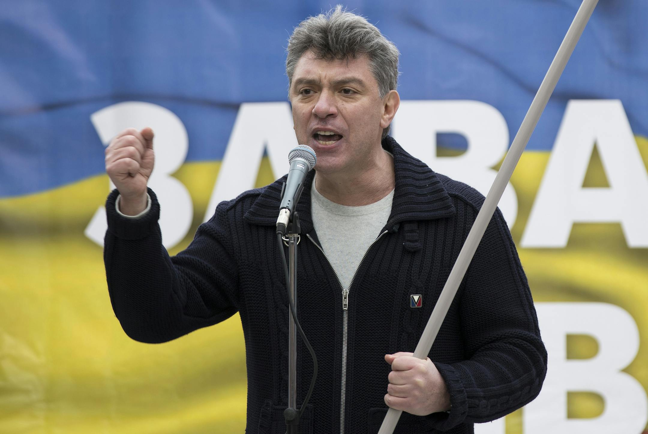 In this photo taken on Saturday, March 15, 2014, Boris Nemtsov, a former Russian deputy prime minister and opposition leader addresses demonstrators during a massive rally to oppose president Vladimir Putin's policies in Ukraine, in Moscow, Russia. Nemtsov was gunned down Saturday near the Kremlin, just a day before a planned protest against the government. (AP Photo/Alexander Zemlianichenko) ORG XMIT: MIN2015031112061932
